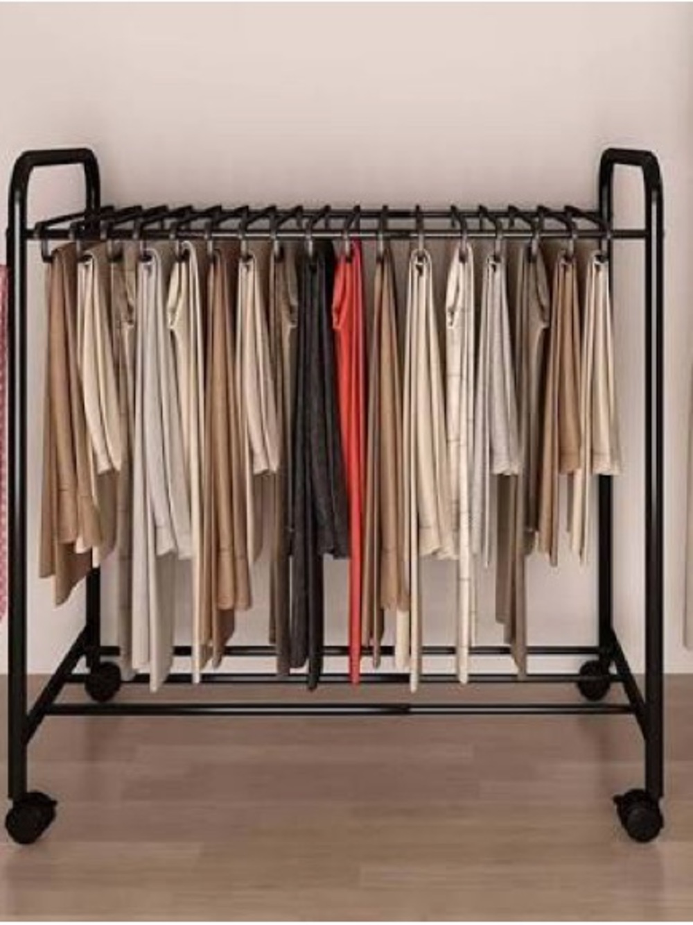 Black Rolling Garment Rack. Space saving and slick. Easy rolling was $89